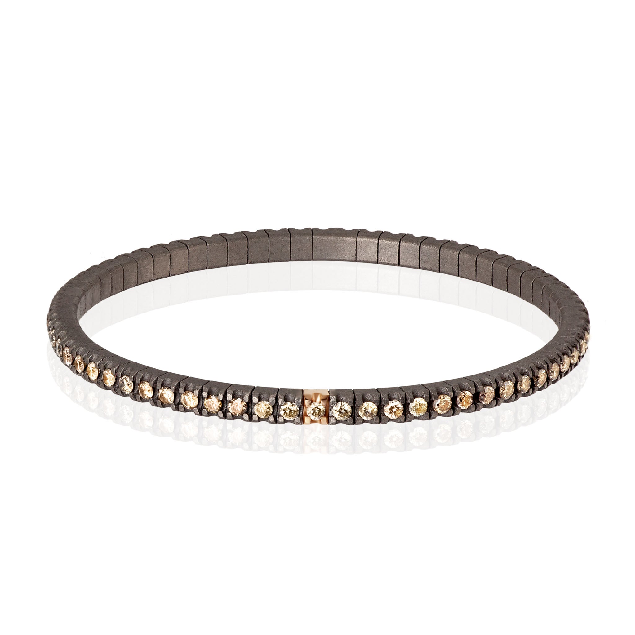 BRACCIALE TENNIS LINEA ELASTICA IN TITANIO, ORO ROSSO 18 KT E DIAMANTI BROWN DA 3 PUNTI.